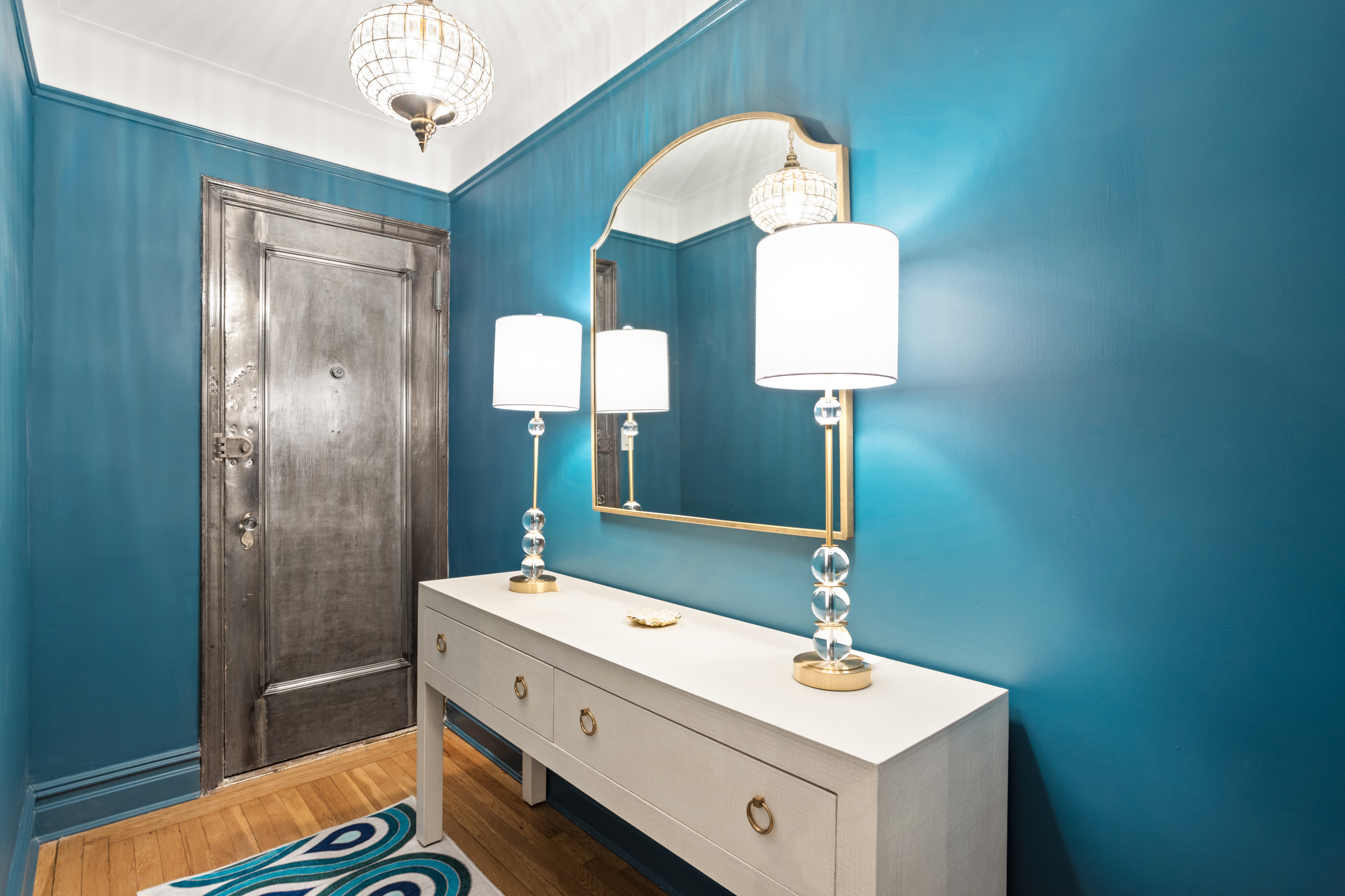 107 West 86th Street, Unit 3H Manhattan, NY 10024 - Photo 7 of 7 a bathroom with a sink mirror and a shower