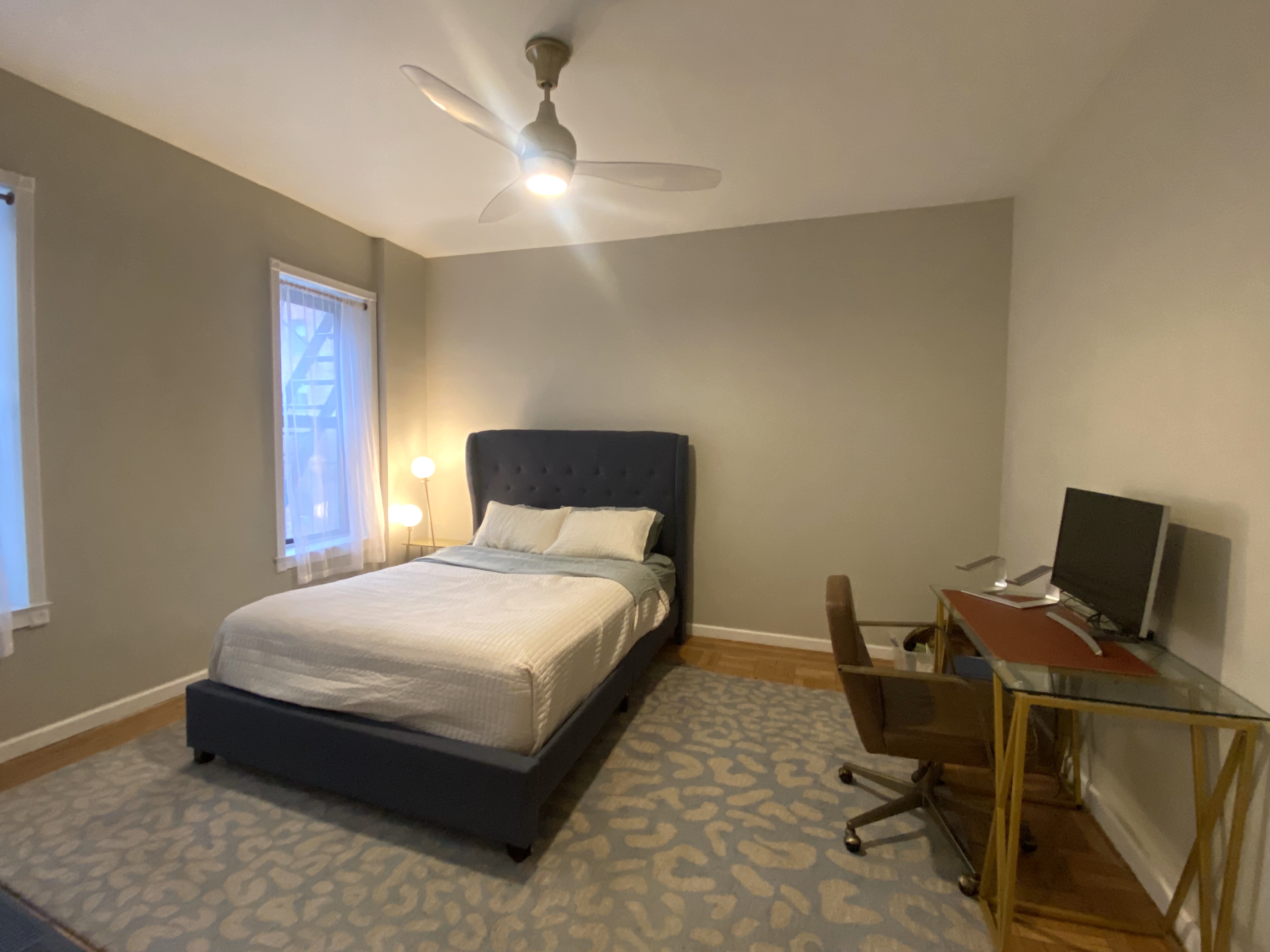 7101 Colonial Road, Unit L4G Brooklyn, NY 11209 - Photo 5 of 8 a bedroom with a bed and a desk