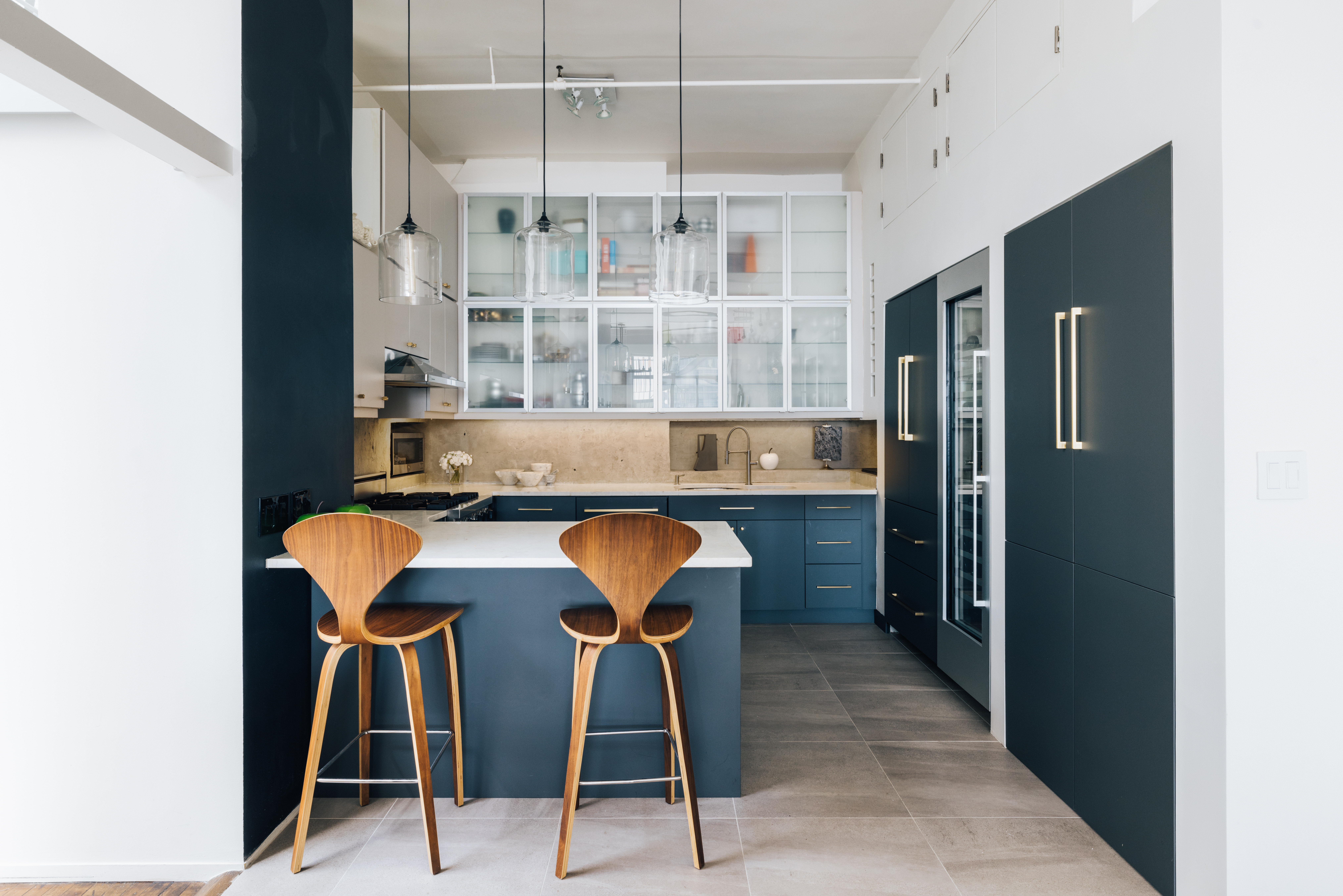 718 Broadway, Unit PHC Manhattan, NY 10003 - Photo 12 of 21 a view of a dining room with furniture and a chandelier