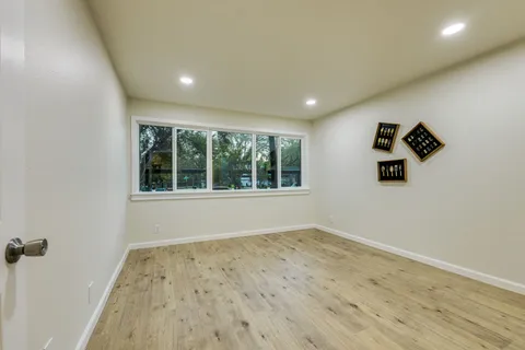 a view of empty room with a window
