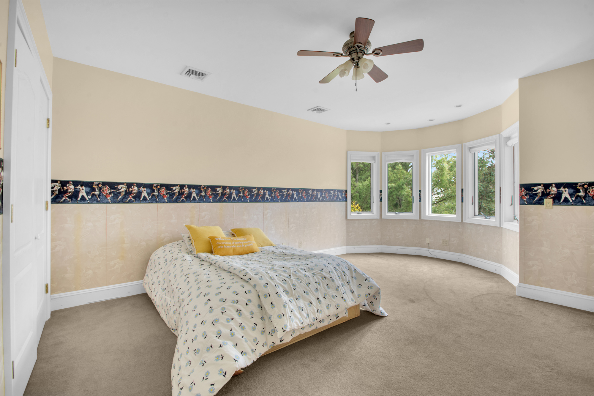 68 Circle Road Staten Island, NY 10304 - Photo 24 of 38 a bedroom with a bed and ceiling fan