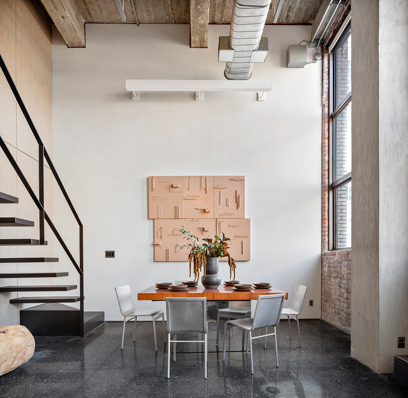 330 Wythe Avenue, Unit 6I Brooklyn, NY 11249 - Photo 6 of 14 a dining room with furniture and wooden floor