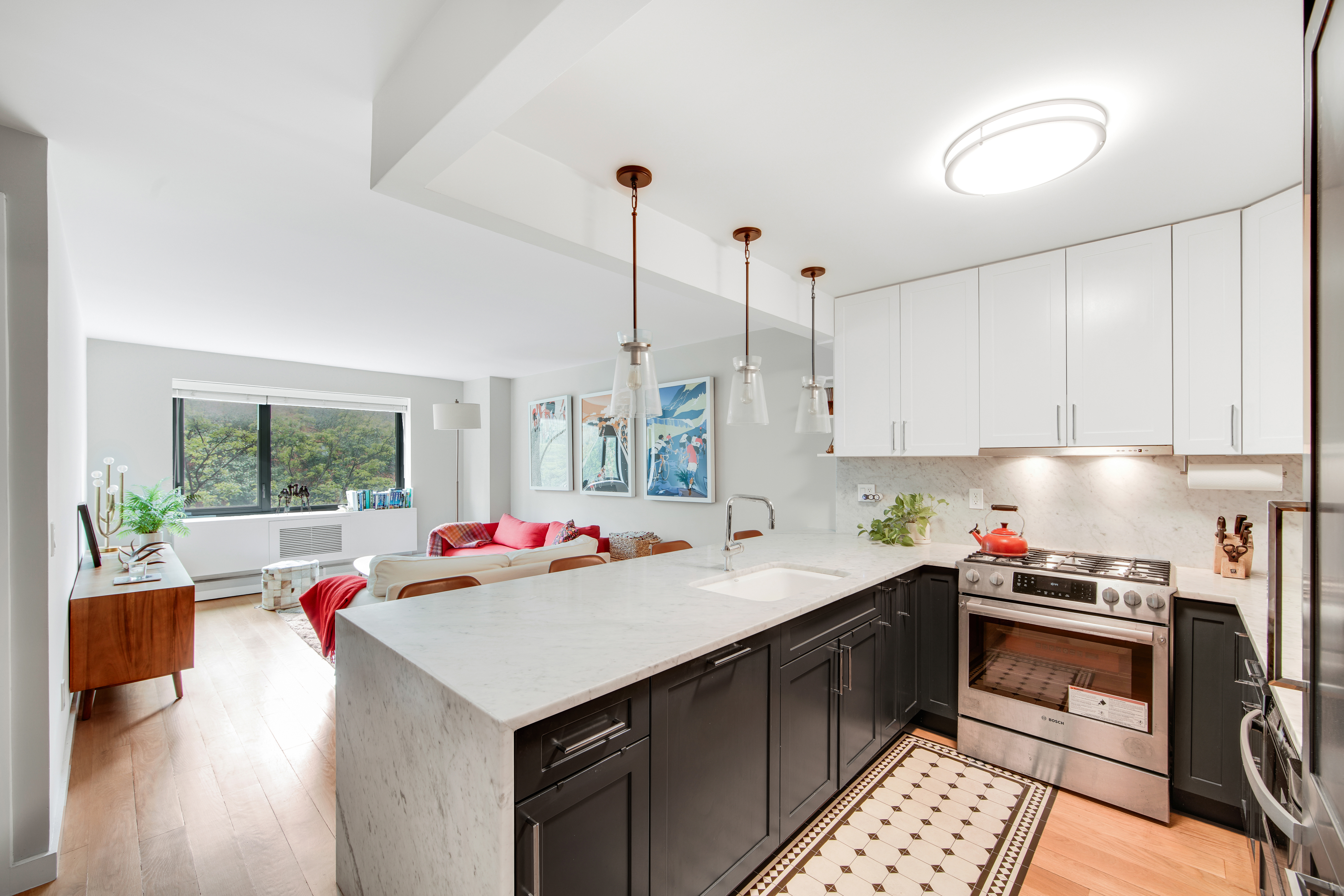 1330 5th Avenue, Unit 3F Manhattan, NY 10026 - Photo 1 of 16 a kitchen with a stove a sink and a refrigerator
