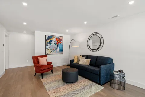 a bedroom with a bed and lamp