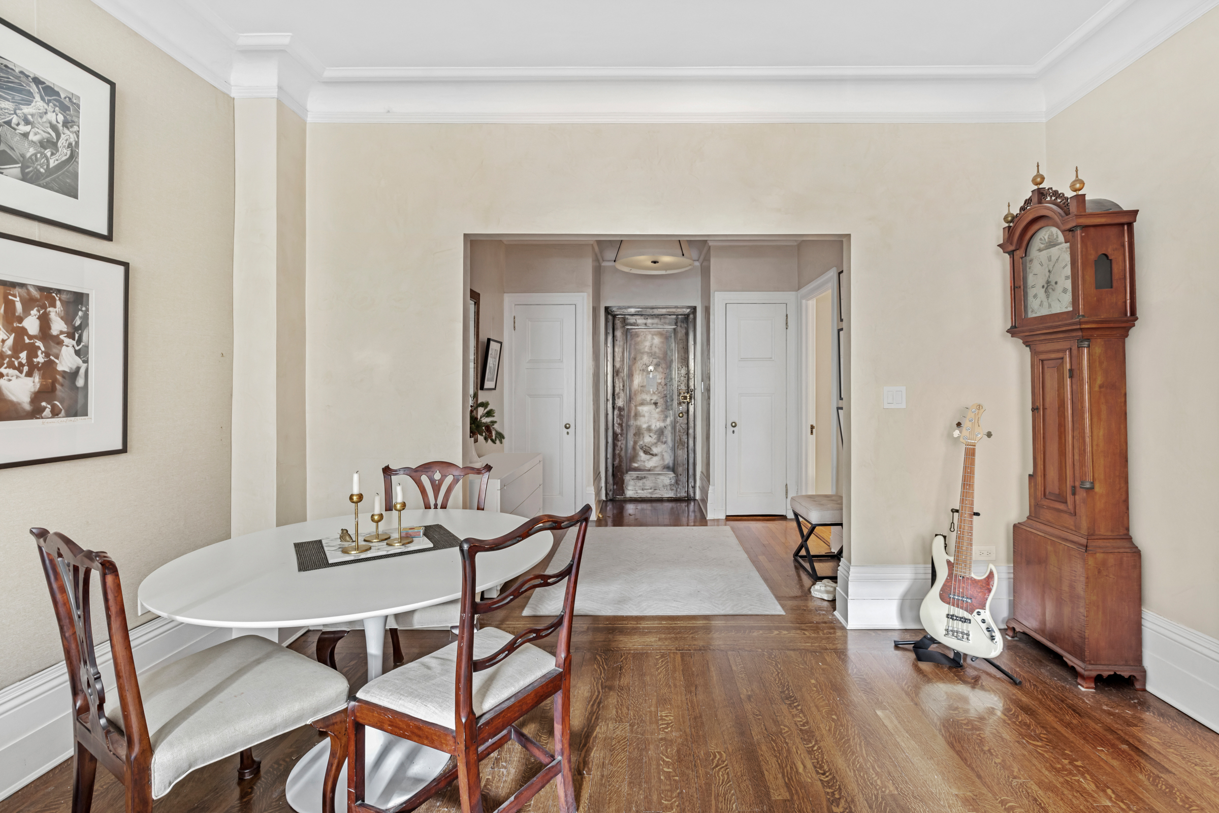 50 West 67th Street, Unit 5F Manhattan, NY 10023 - Photo 4 of 13 a view of a livingroom with furniture and wooden floor