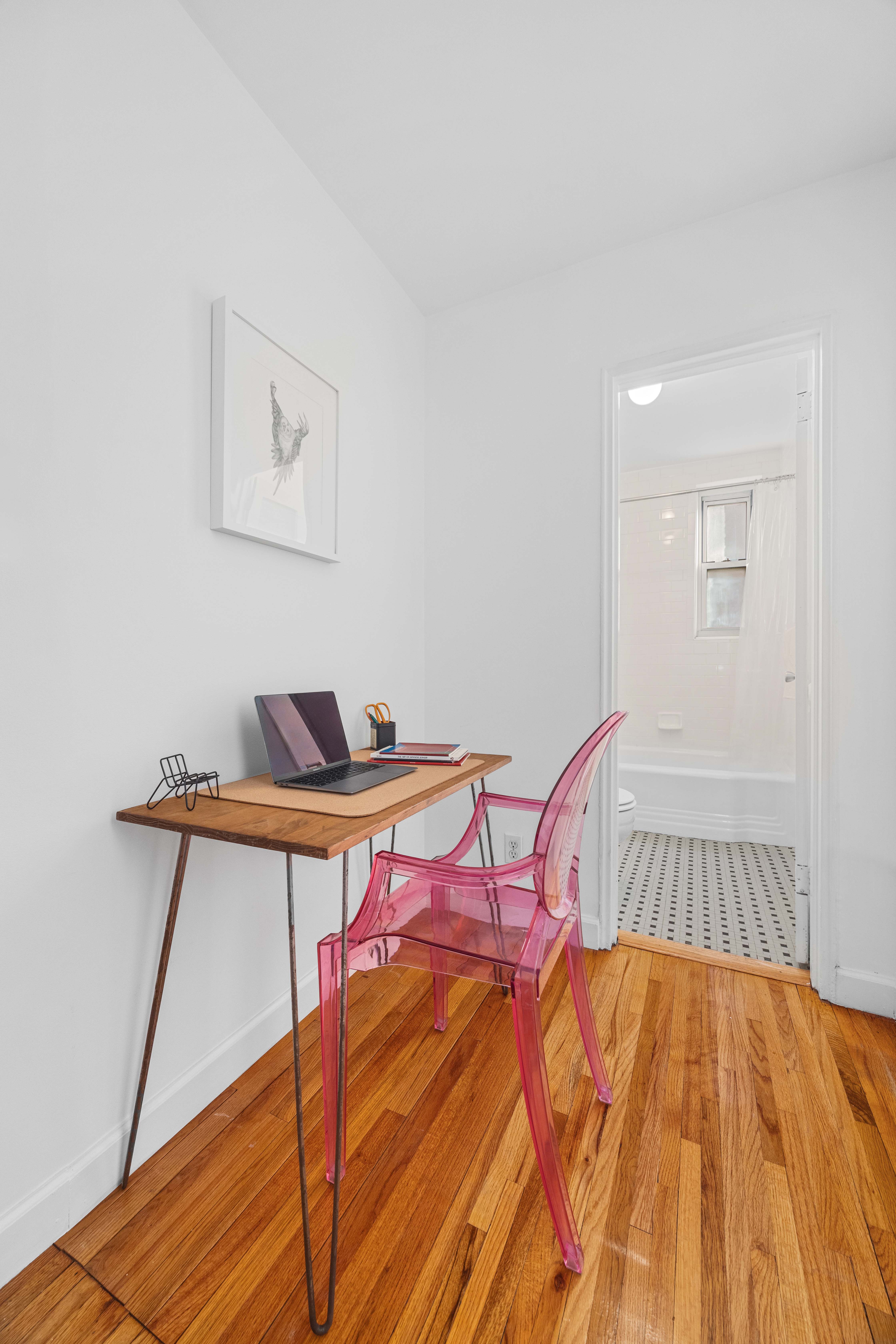 221 McDonald Avenue, Unit 2R Brooklyn, NY 11218 - Photo 5 of 8 a room with a bed and a table