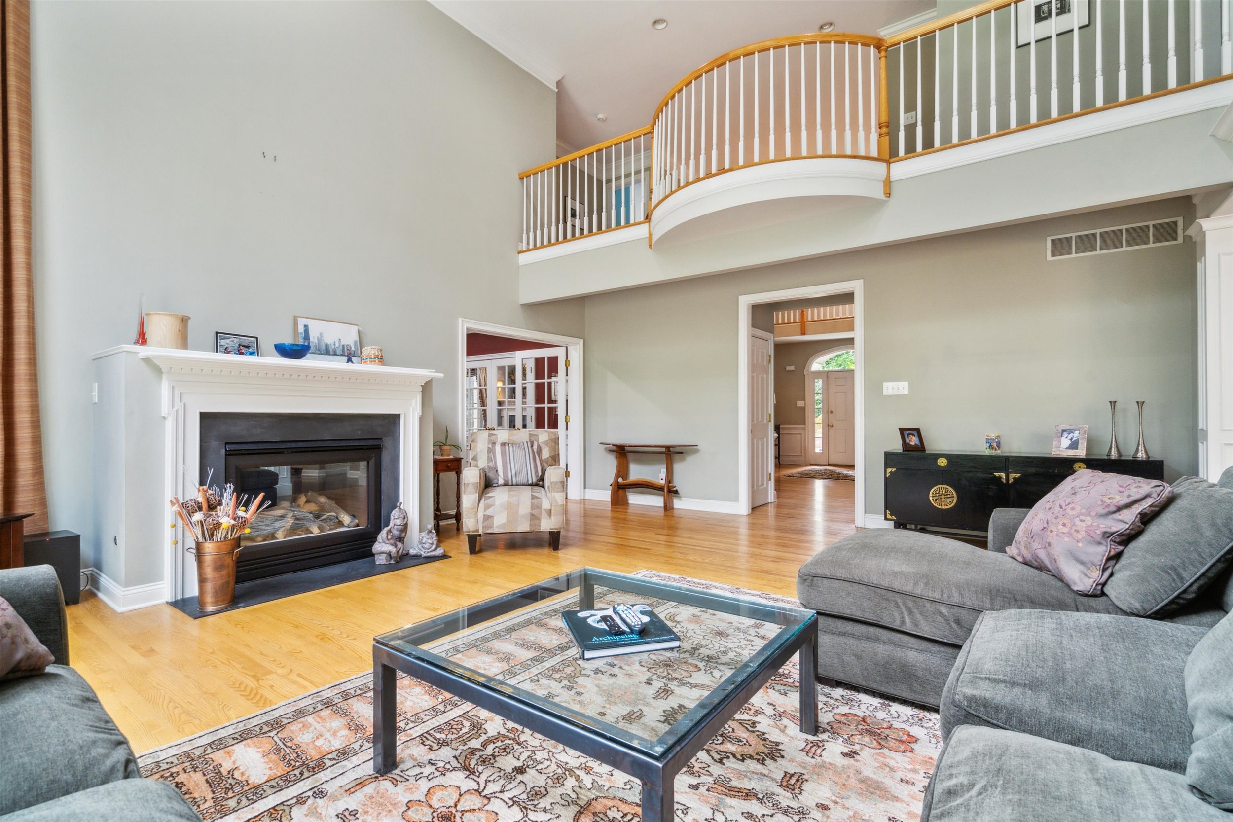 145 Biddulph Road Wayne, PA 19087 - Photo 12 of 39 a living room with furniture and a fireplace