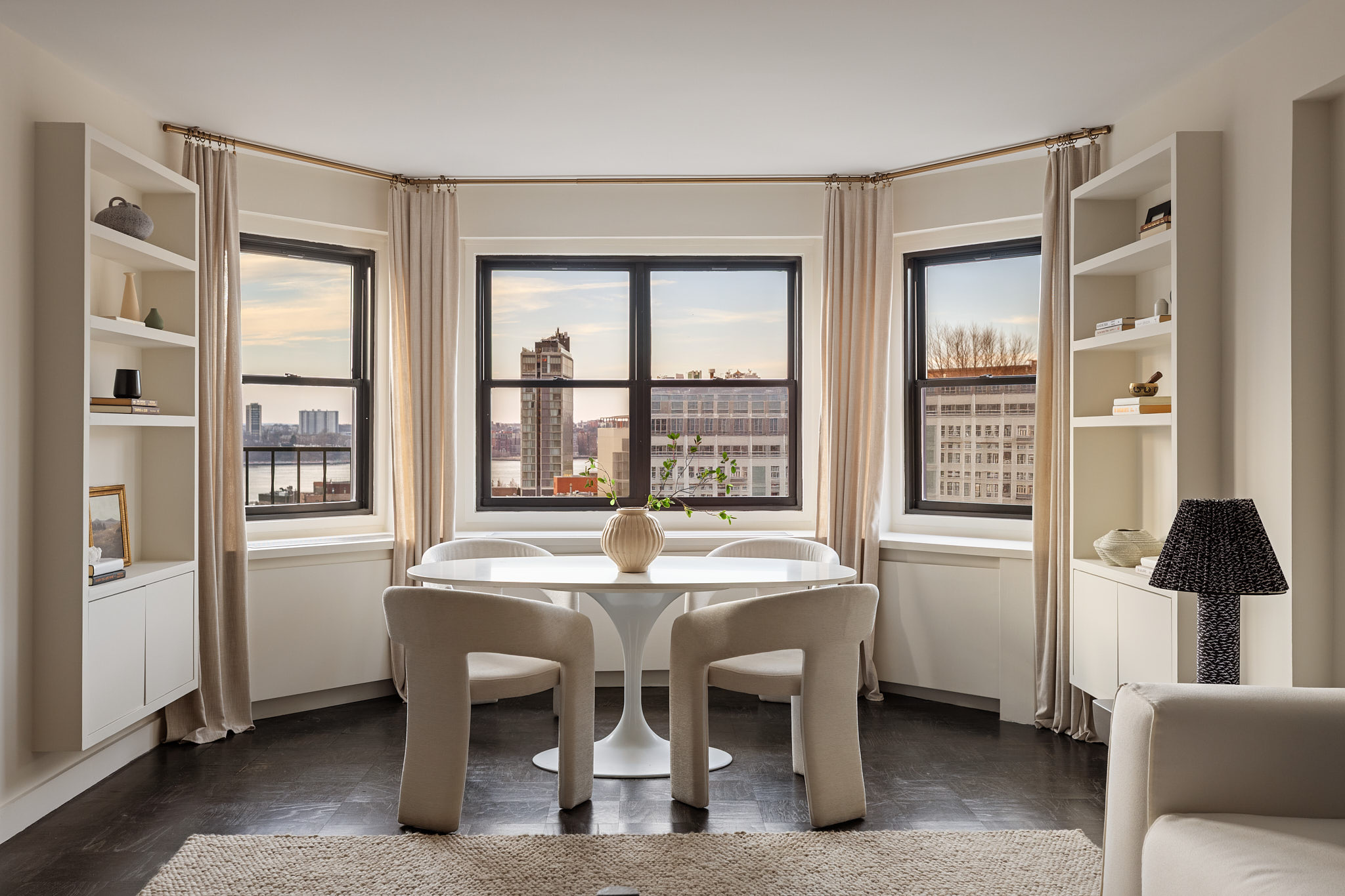 31 Jane Street, Unit 16G Manhattan, NY 10014 - Photo 4 of 20 a dining room with furniture and window