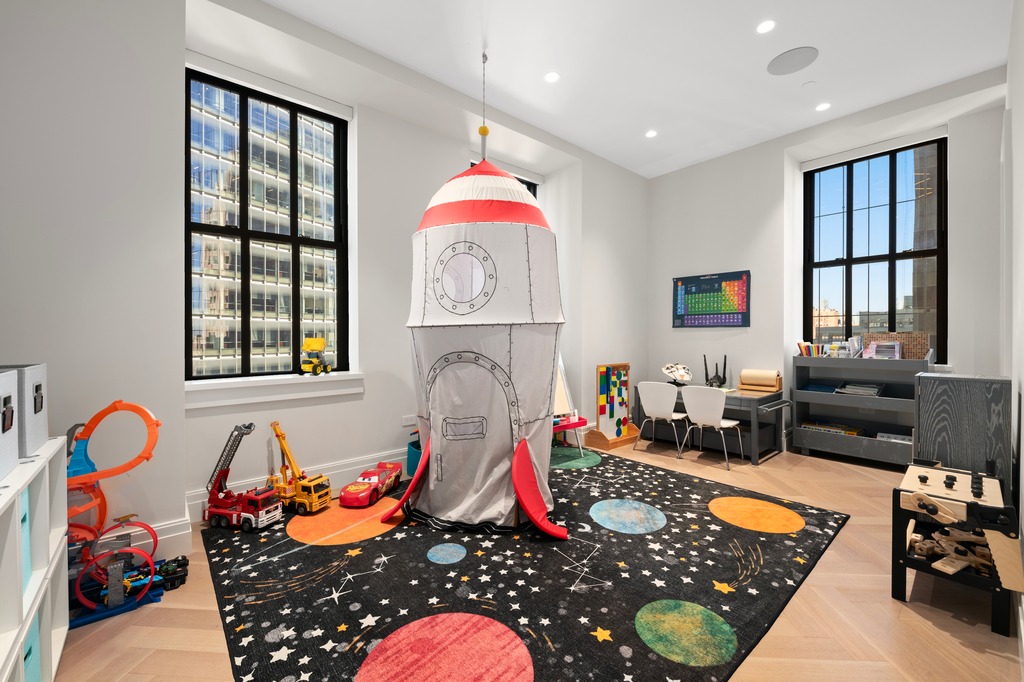 100 Barclay Street, Unit 21AD Manhattan, NY 10007 - Photo 16 of 40 a living room with furniture chess board and a window