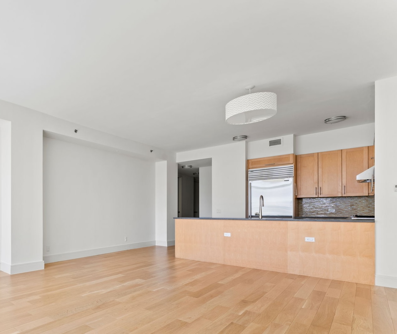 545 West 110th Street, Unit 5A Manhattan, NY 10025 - Photo 16 of 20 a view of a kitchen with a sink and a cabinet
