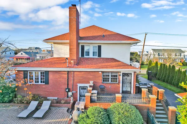 an aerial view of a house with a garden
