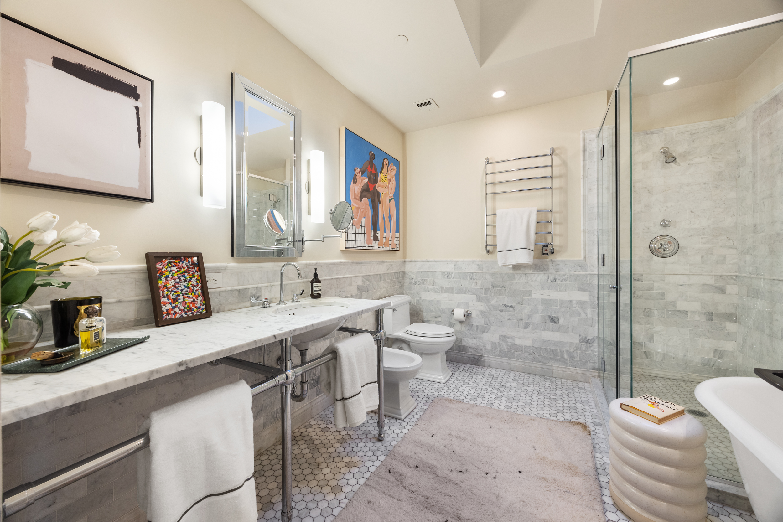 481 Washington Street, Unit PHS Manhattan, NY 10013 - Photo 14 of 20 a bathroom with a double vanity sink toilet and shower