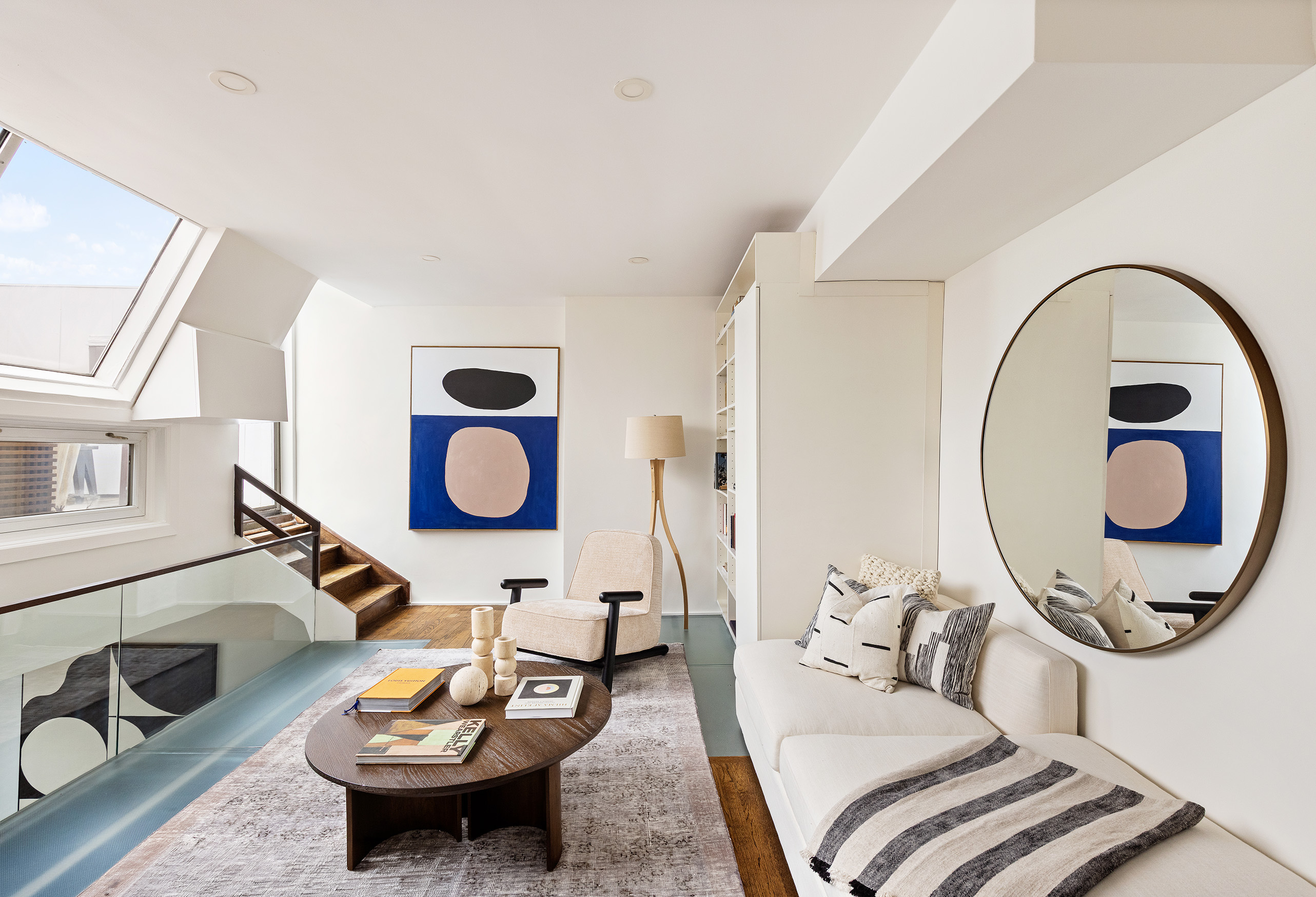 333 West 22nd Street, Unit 5A Manhattan, NY 10011 - Photo 7 of 12 a living room with furniture and a wooden floor