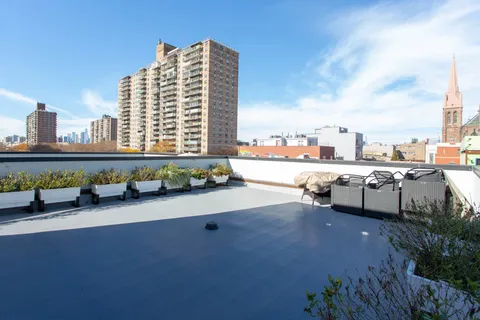 a view of outdoor space with seating area