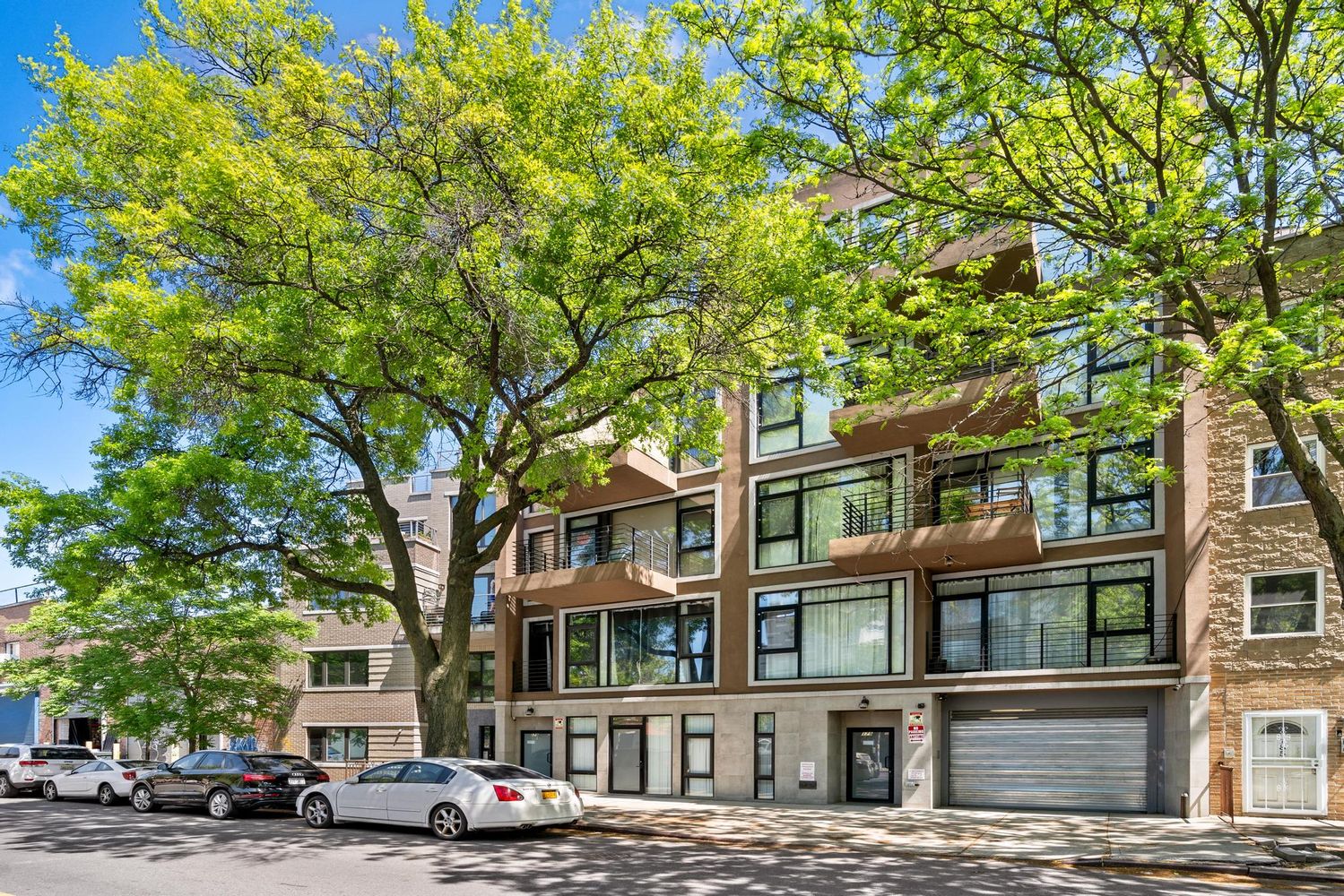 179 Woodpoint Road, Unit 4A Brooklyn, NY 11211 - Photo 10 of 16 a front view of a building with street view