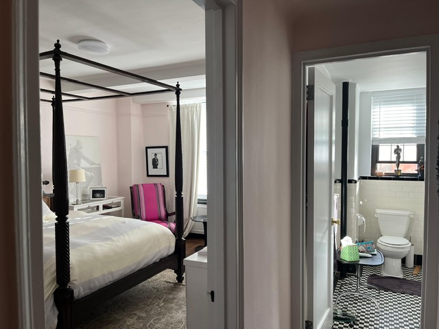 435 West 23rd Street, Unit 7B Manhattan, NY 10011 - Photo 12 of 23 a bedroom with a bed and a couch