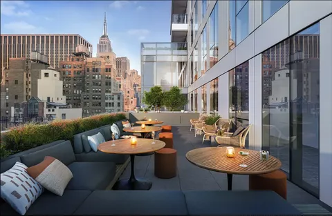 a outdoor space with patio couches and a potted plant