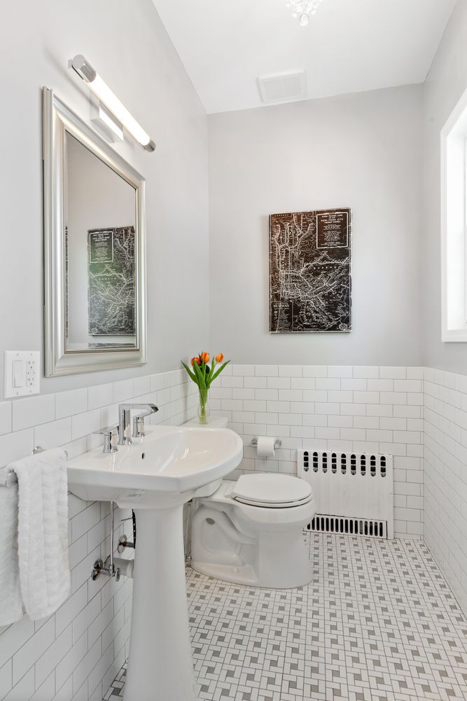 685 East 22nd Street Brooklyn, NY 11210 - Photo 13 of 43 a bathroom with a sink and a mirror