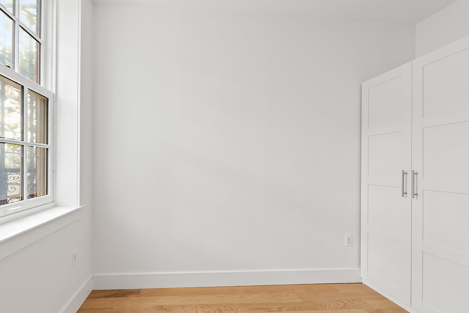 69 Hudson Avenue, Unit HSE Brooklyn, NY 11201 - Photo 18 of 20 a view of a small space with wooden floor and a window