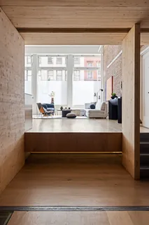 a bedroom with a bed and a desk