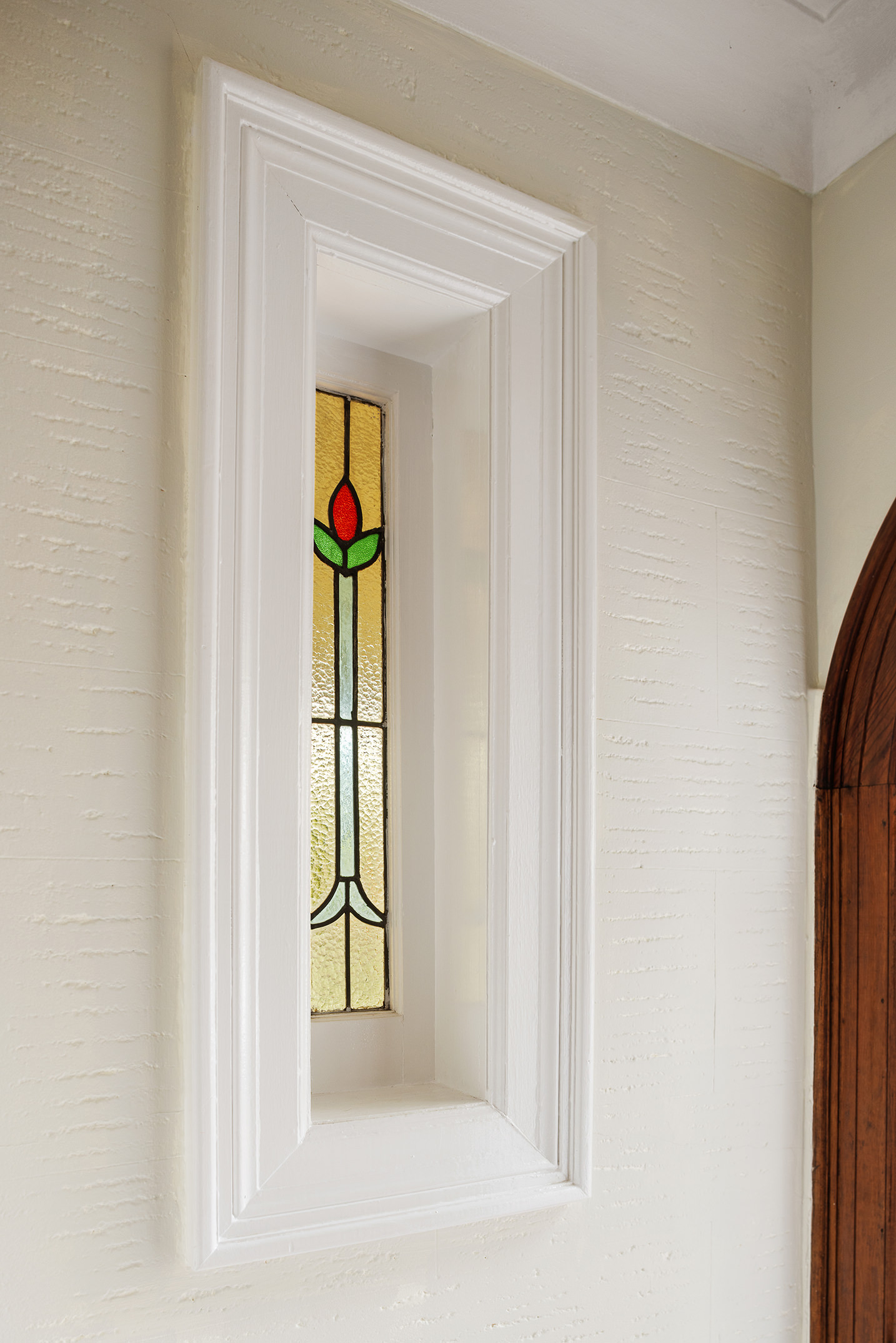 2536 Lurting Avenue Bronx, NY 10469 - Photo 3 of 27 a view of a hallway with wooden floor and a bathroom
