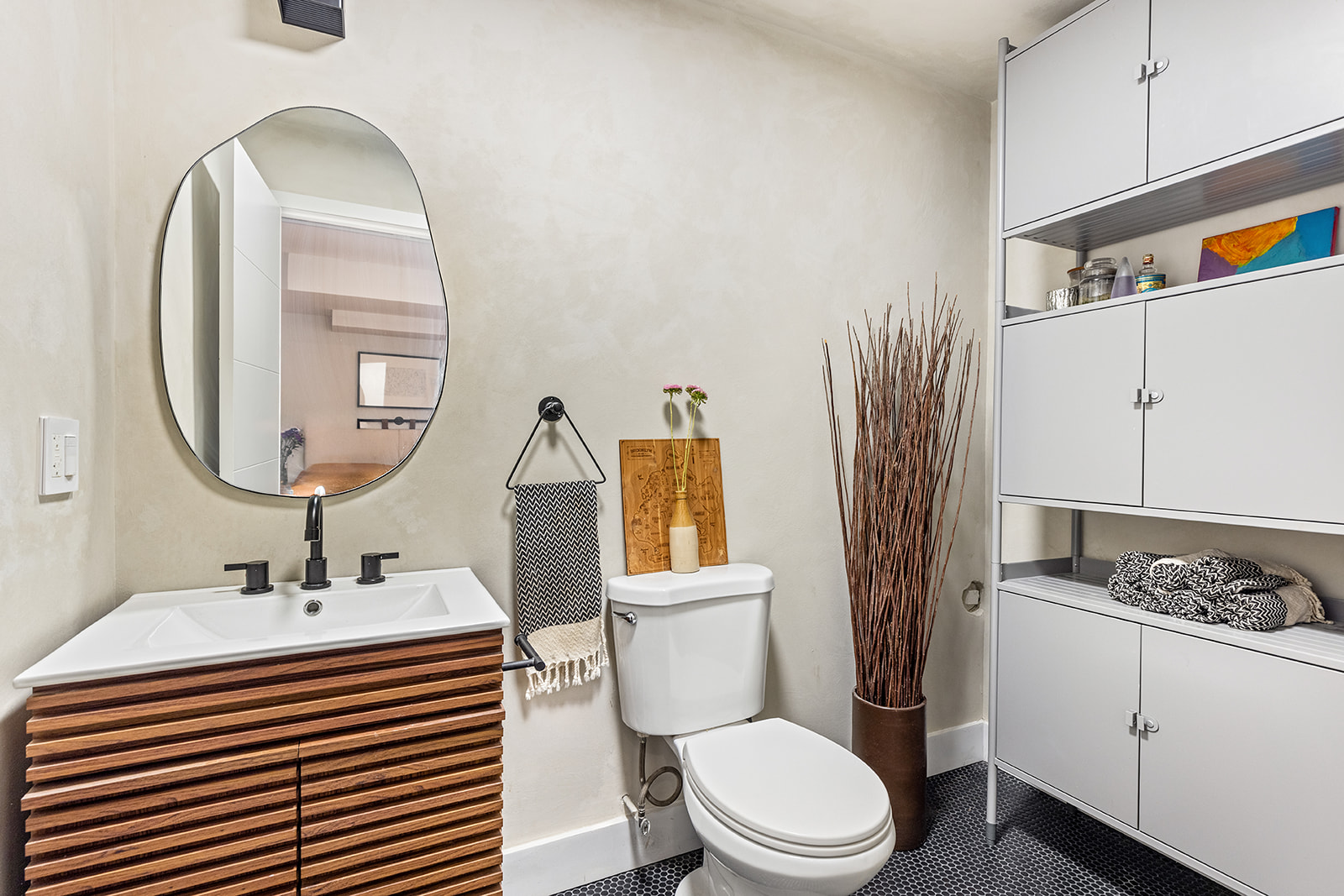 495 Rutland Road, Unit 1 Brooklyn, NY 11203 - Photo 11 of 13 a bathroom with a sink a toilet and a mirror