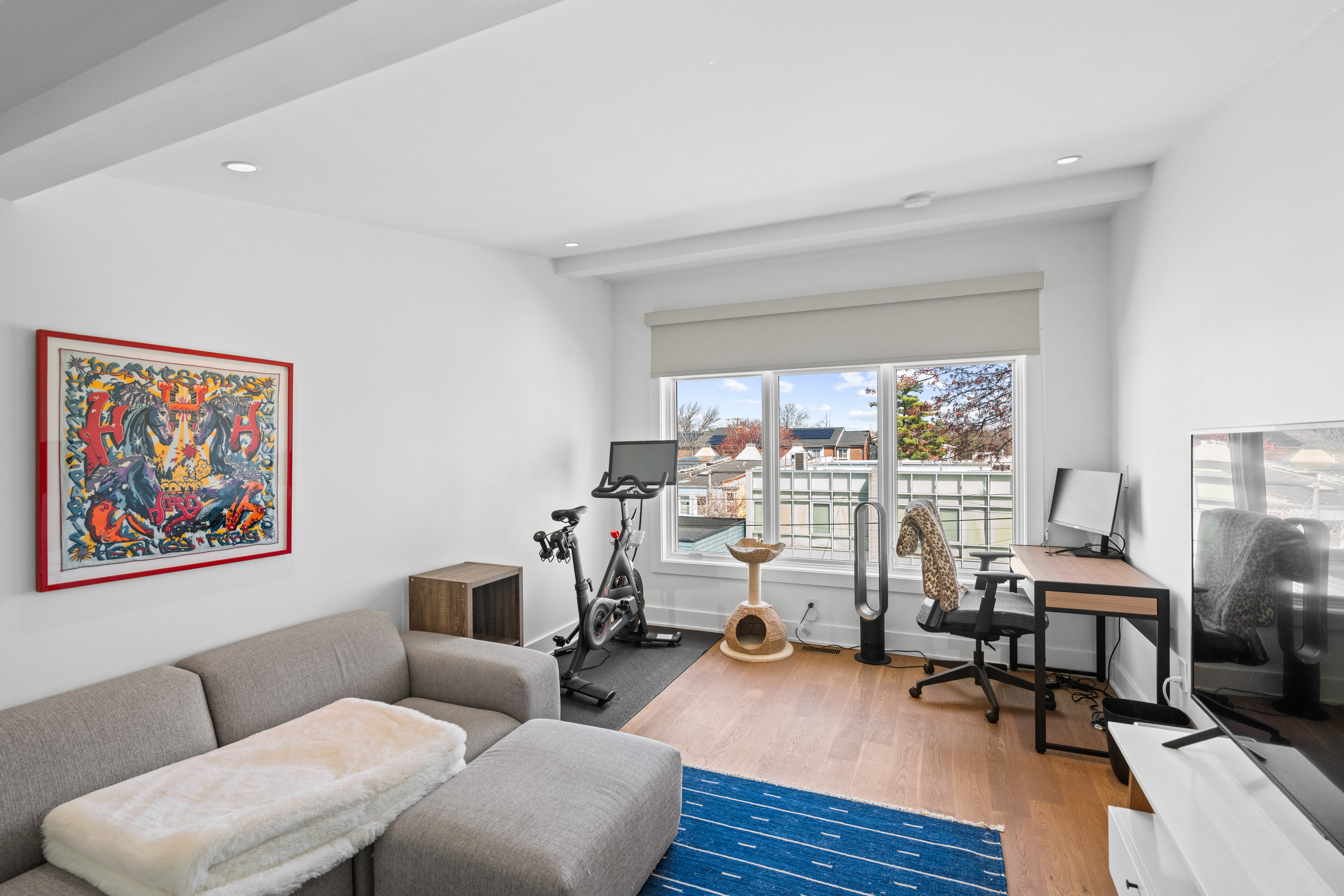 445 Ridge Street Northwest Washington, DC 20001 - Photo 33 of 43 a view of a livingroom with workspace and a couch