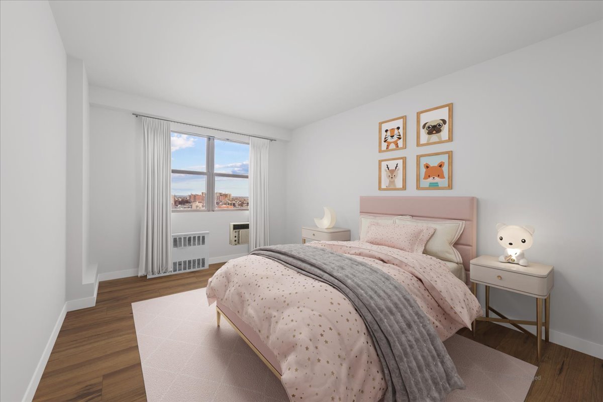 448 Neptune Avenue, Unit 16K Brooklyn, NY 11224 - Photo 11 of 28 a bedroom with a bed and a window