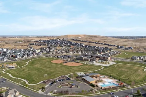 a view of a building with sitting area