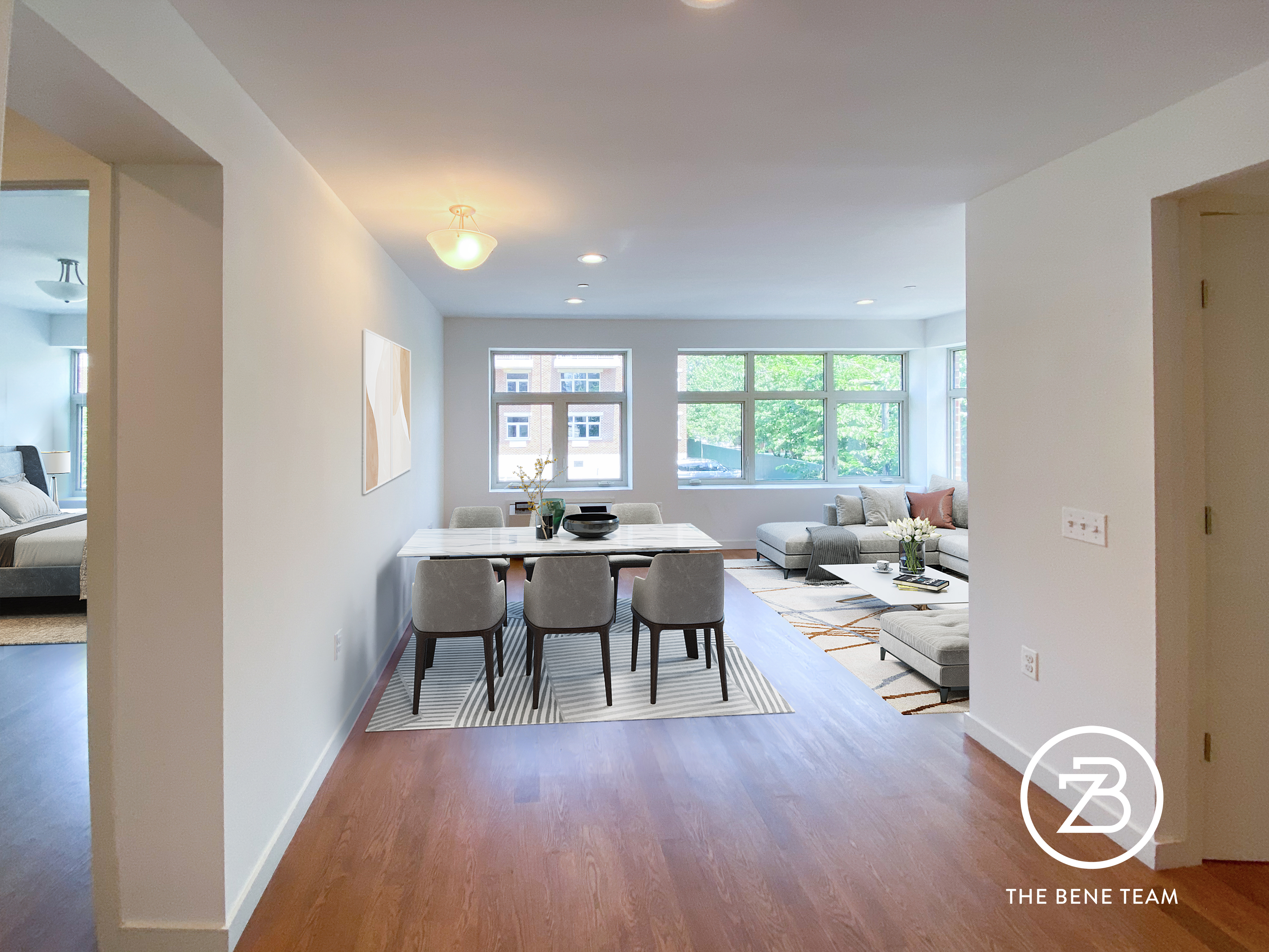 14-25 27th Avenue, Unit 3A Queens, NY 11102 - Photo 2 of 9 a view of a livingroom with furniture window and wooden floor