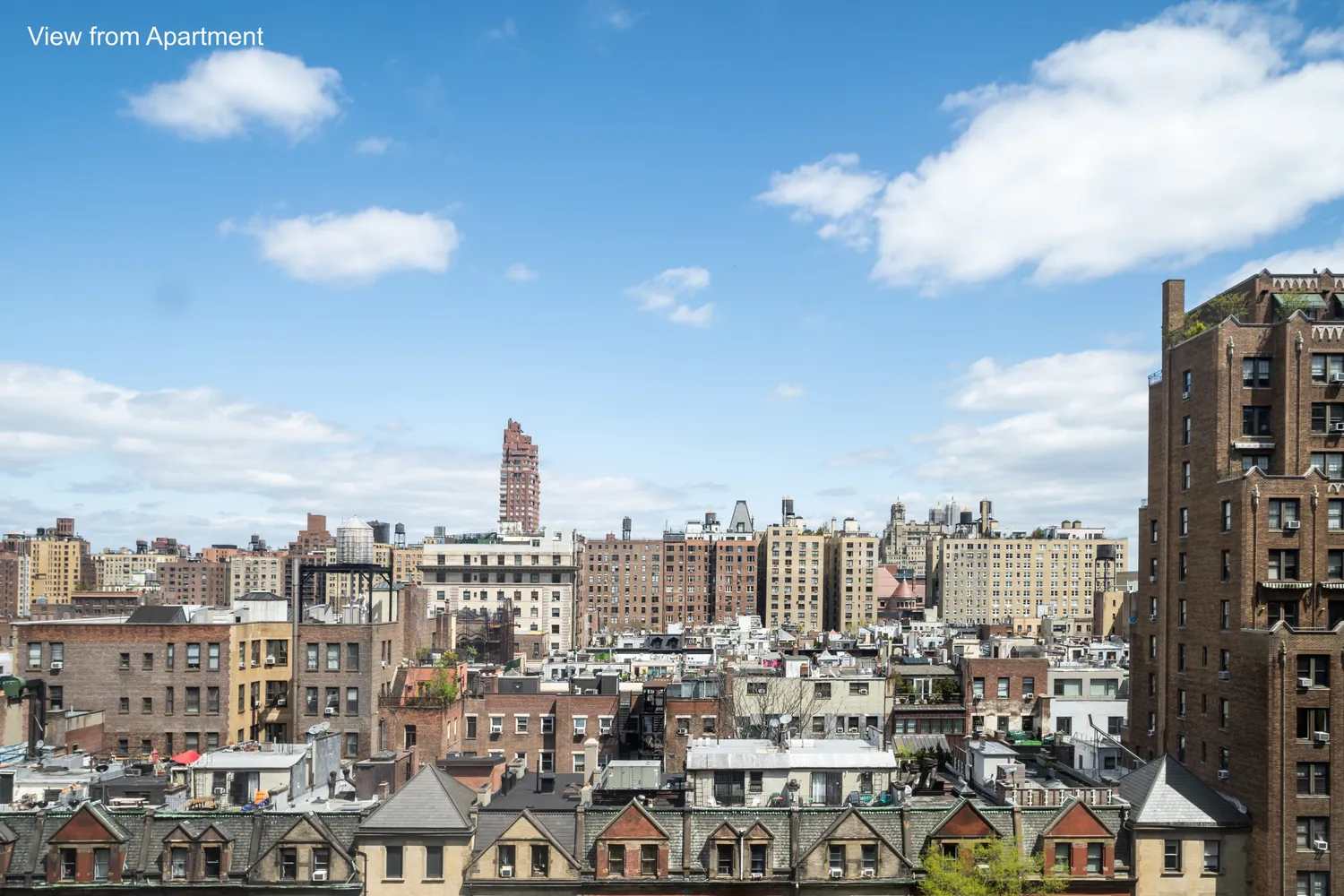 a view of a city with tall buildings