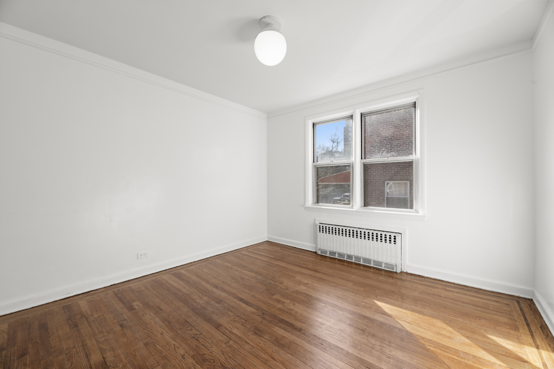 3883 Cannon Place, Unit 3 Bronx, NY 10463 - Photo 6 of 12 an empty room with a window