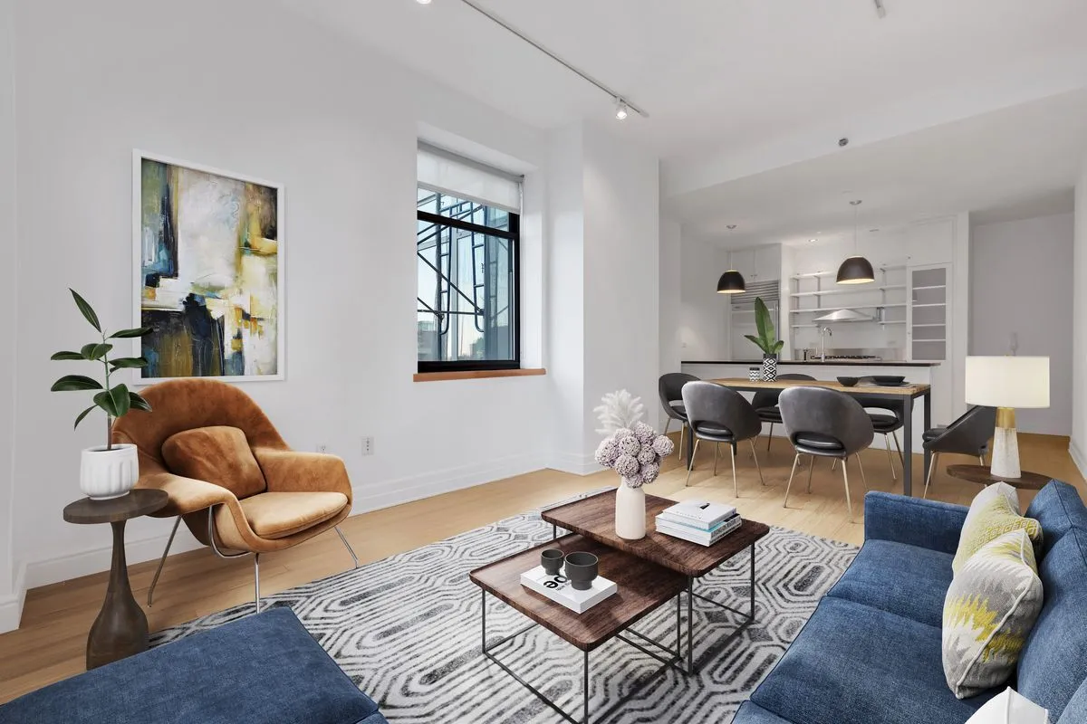 a living room with furniture rug and window