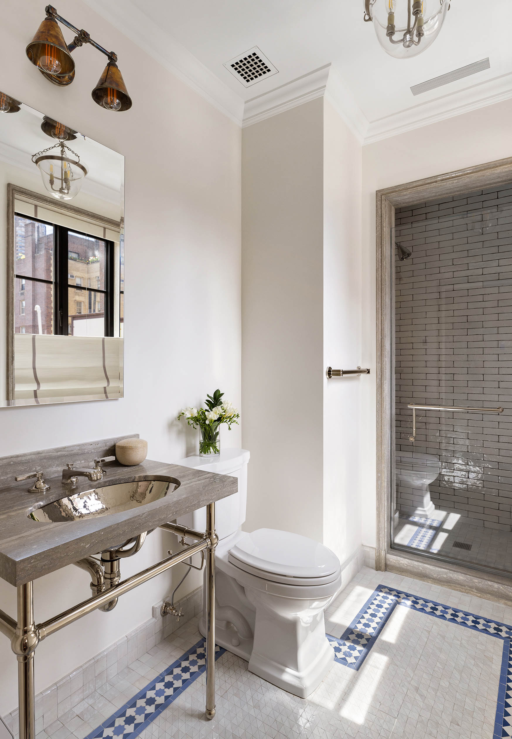 150 East 73rd Street, Unit PH Manhattan, NY 10021 - Photo 21 of 29 a living room with a couch and a potted plant