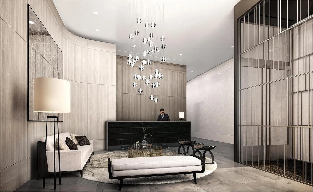 301 East 50th Street, Unit 16B Manhattan, NY 10022 - Photo 14 of 15 a bedroom with furniture and a chandelier