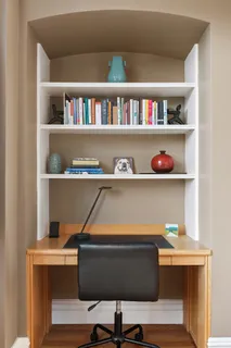 a room with a bookshelf and a bookshelf