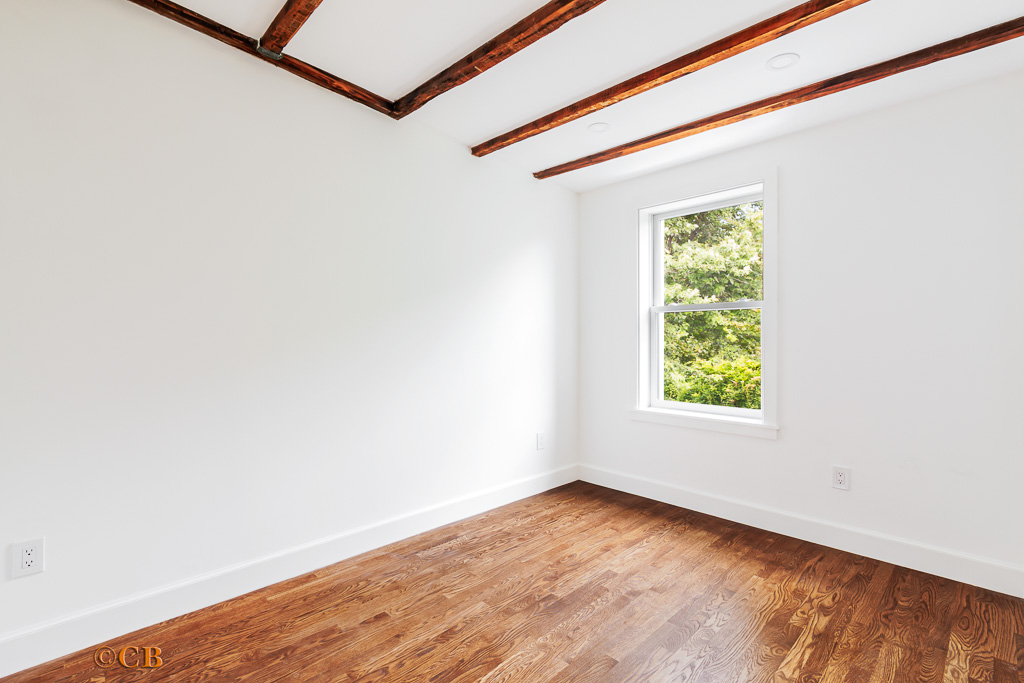 221 Gates Avenue, Unit 2 Brooklyn, NY 11238 - Photo 6 of 7 a view of an empty room with a window