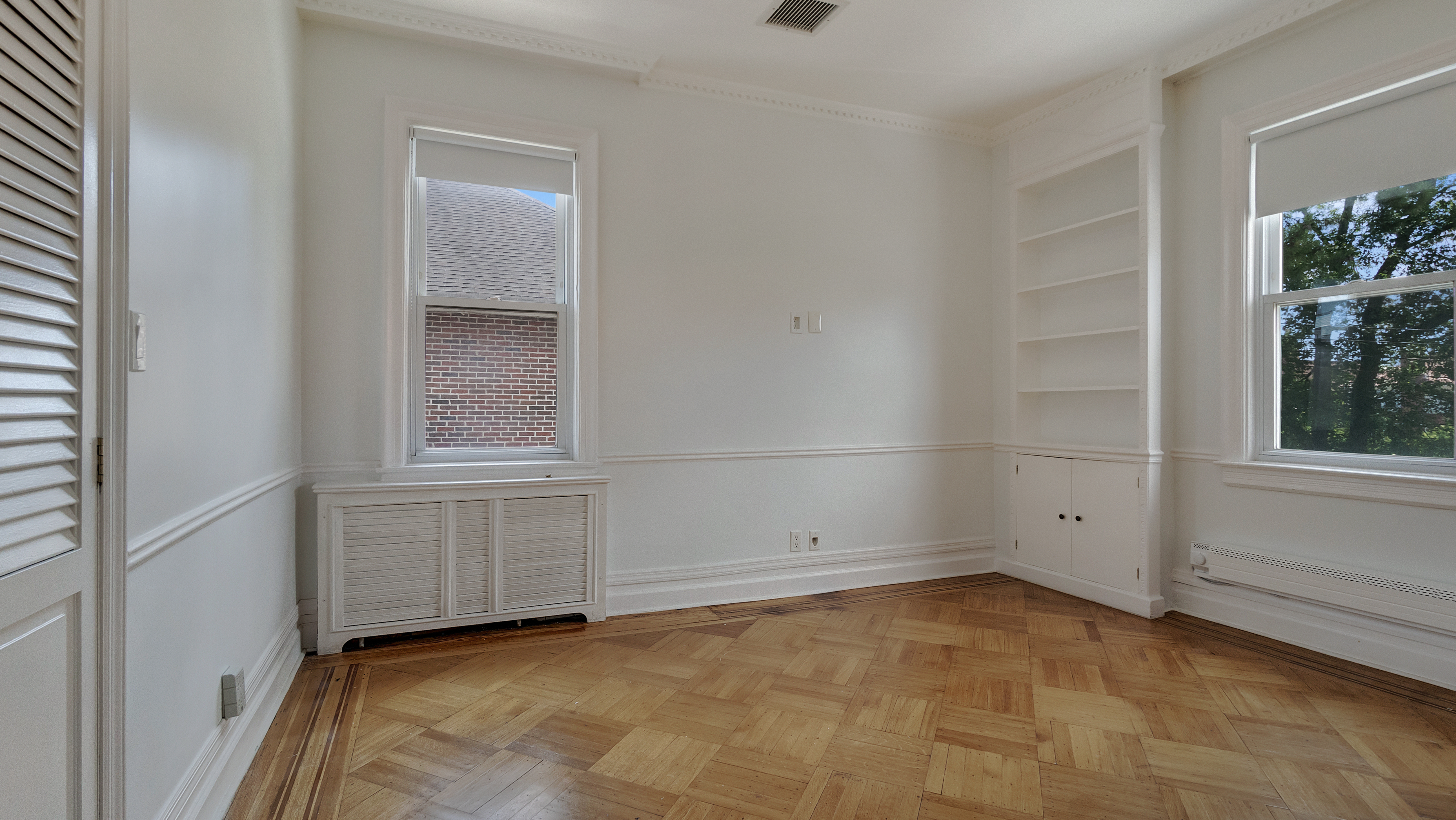 278 Amherst Street Brooklyn, NY 11235 - Photo 19 of 24 an empty room with a empty space and windows