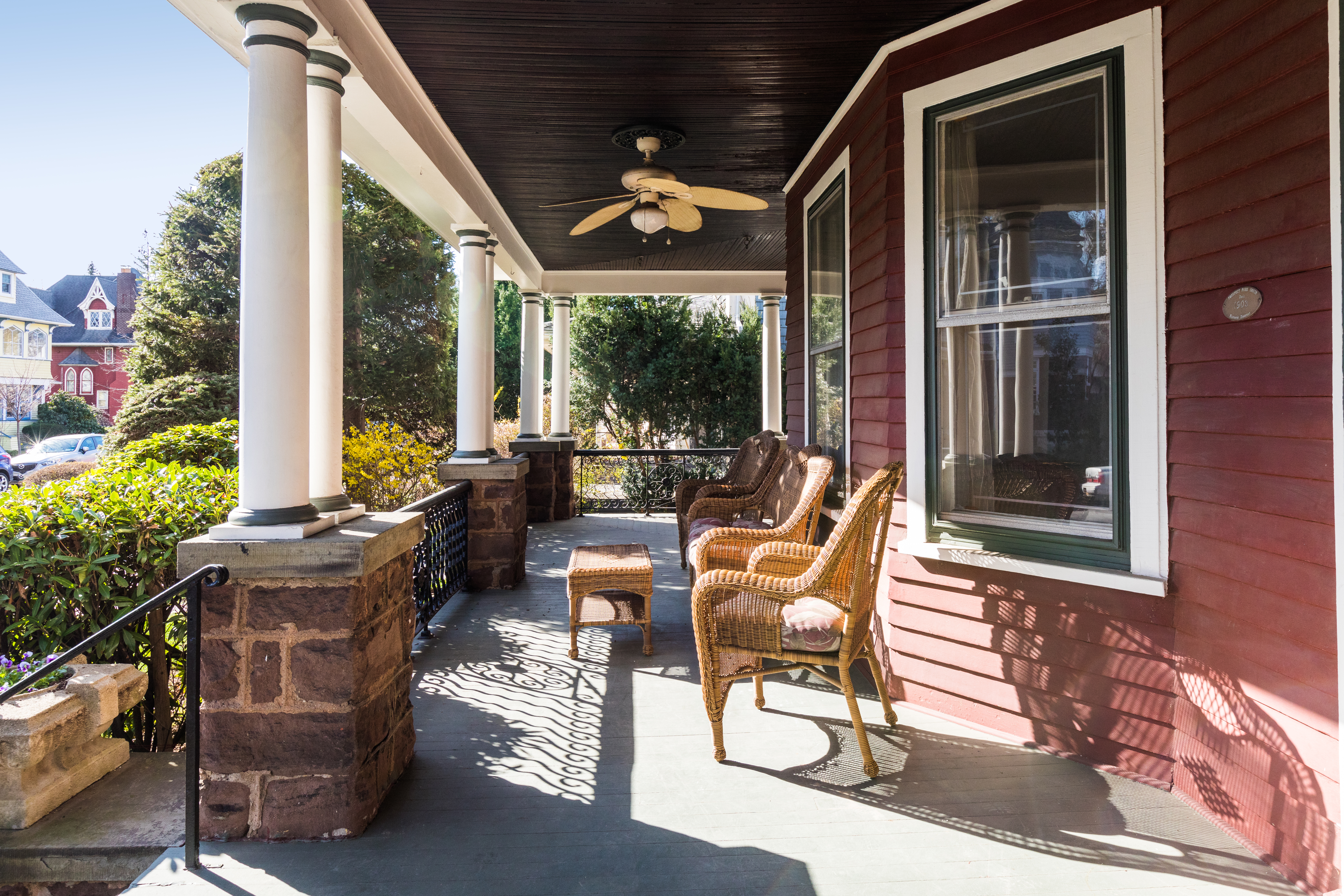 196 Marlborough Road Brooklyn, NY 11226 - Photo 3 of 23 a view of a patio with table and chairs potted plants with wooden floor and fence
