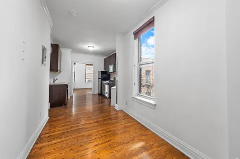 a view of a living room with windows