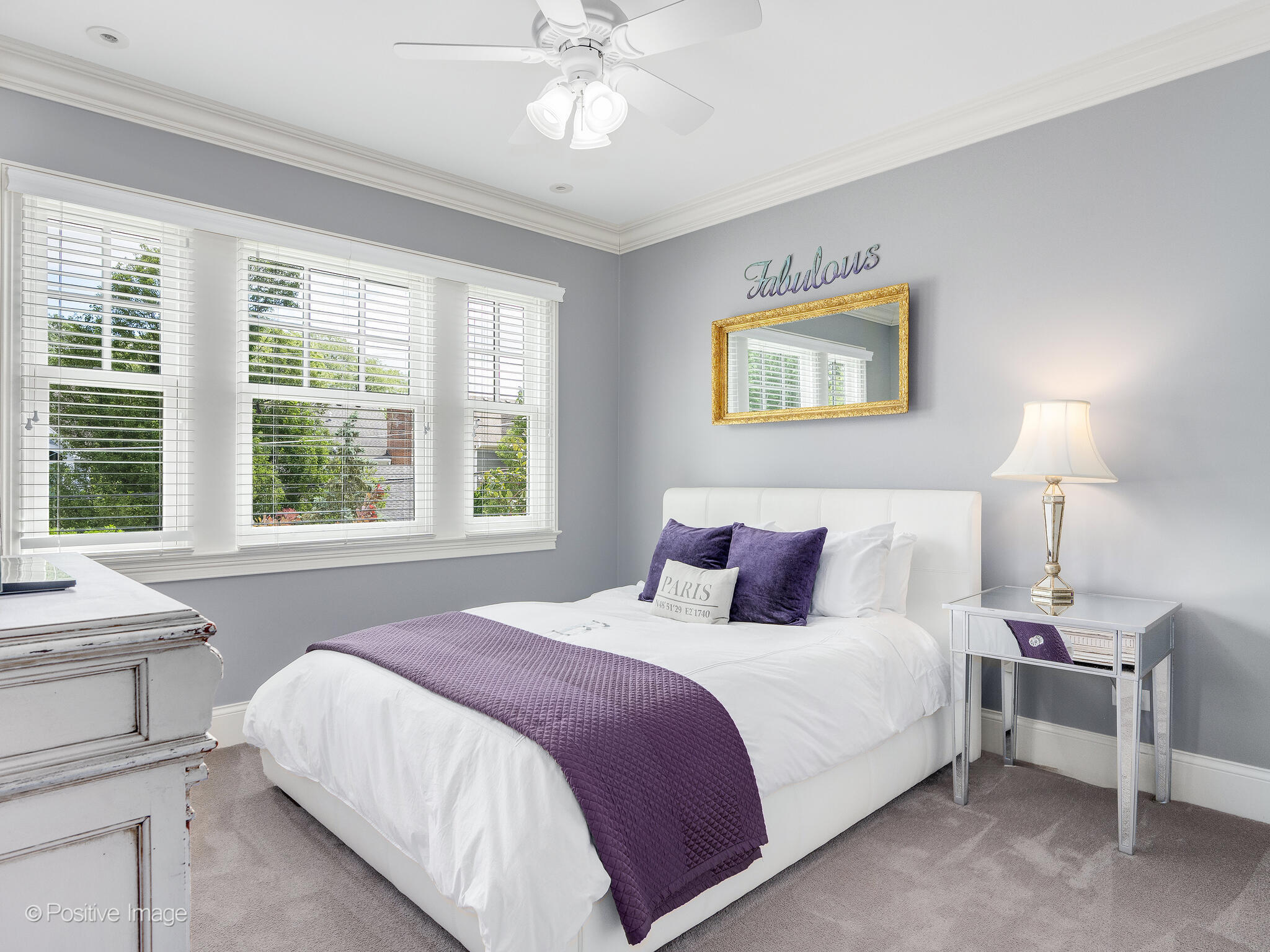 17 South Bruner Street Hinsdale, IL 60521 - Photo 24 of 42 a bedroom with a bed and a lamp on table