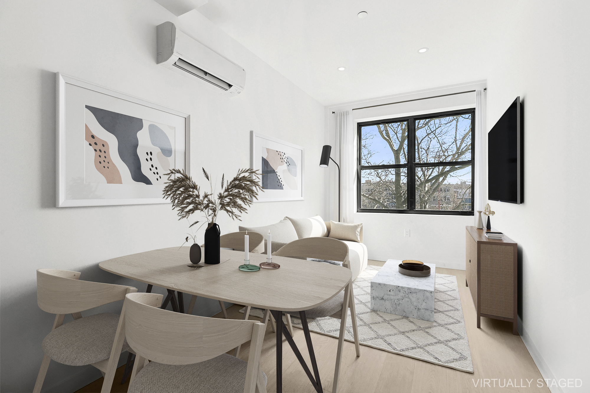 a view of a dining room with furniture and window