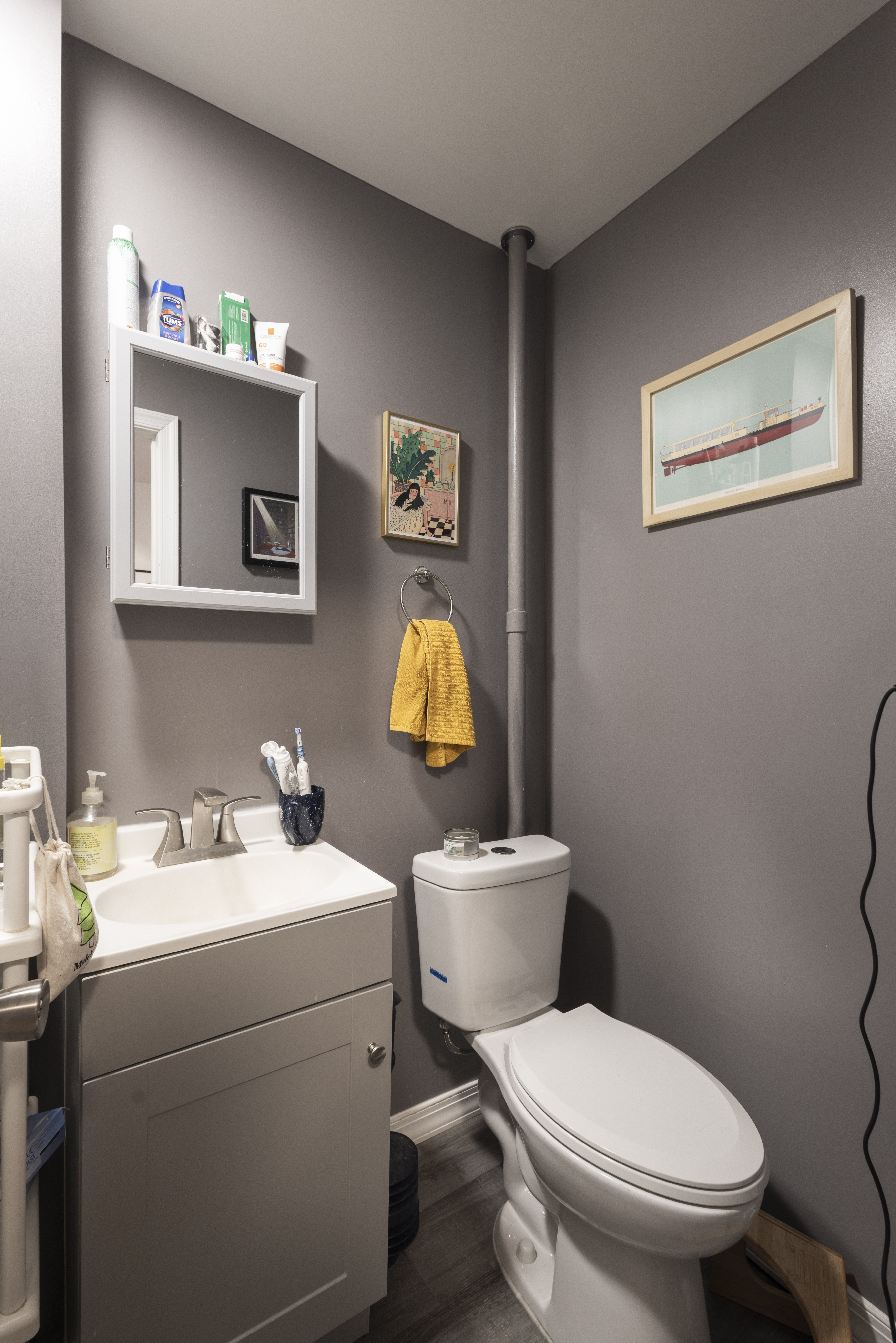 40 A Jewel Street Brooklyn, NY 11222 - Photo 12 of 18 a bathroom with a toilet sink vanity and mirror