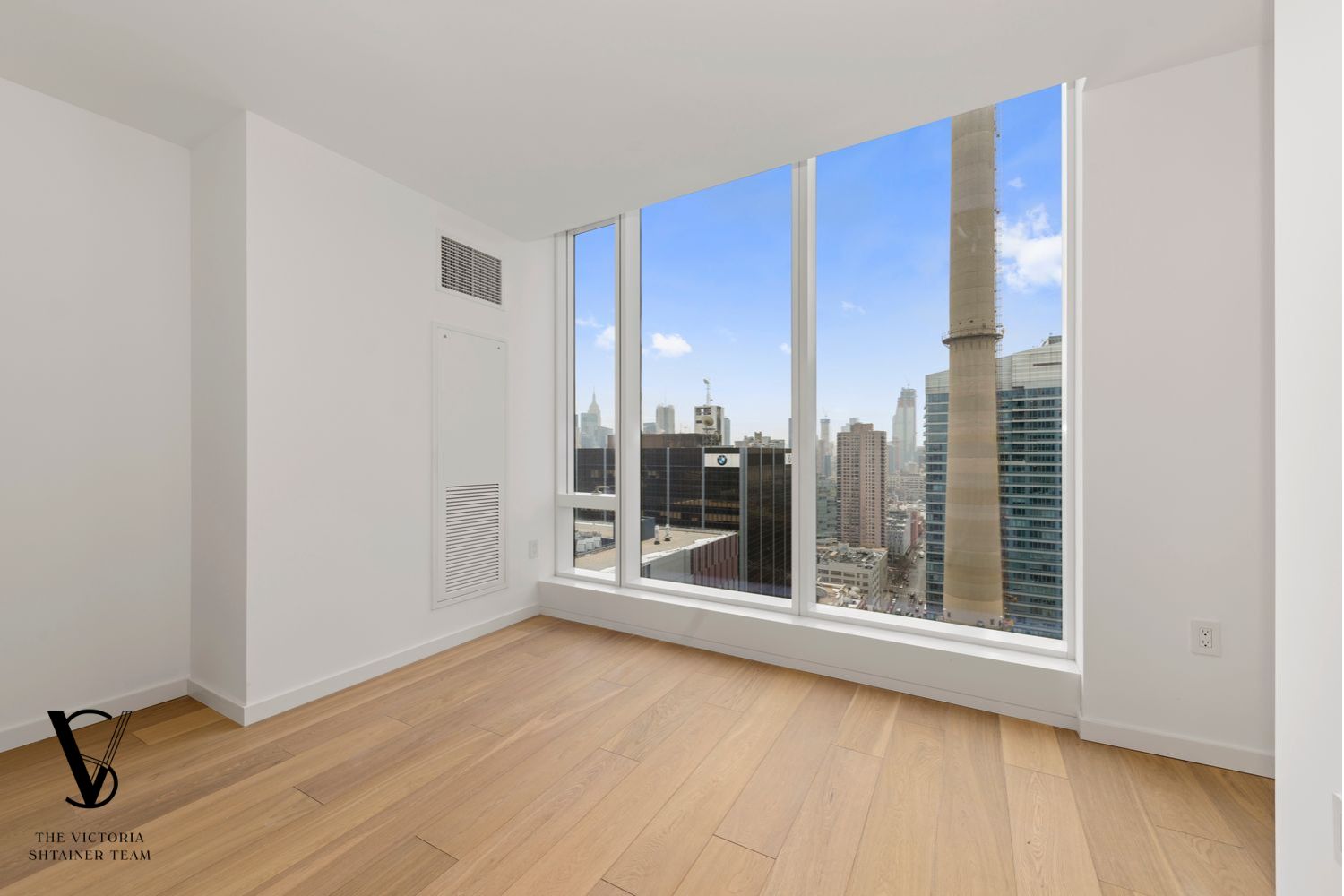 1 West End Avenue, Unit C28 Manhattan, NY 10069 - Photo 11 of 26 a view of a room with wooden floor and a window