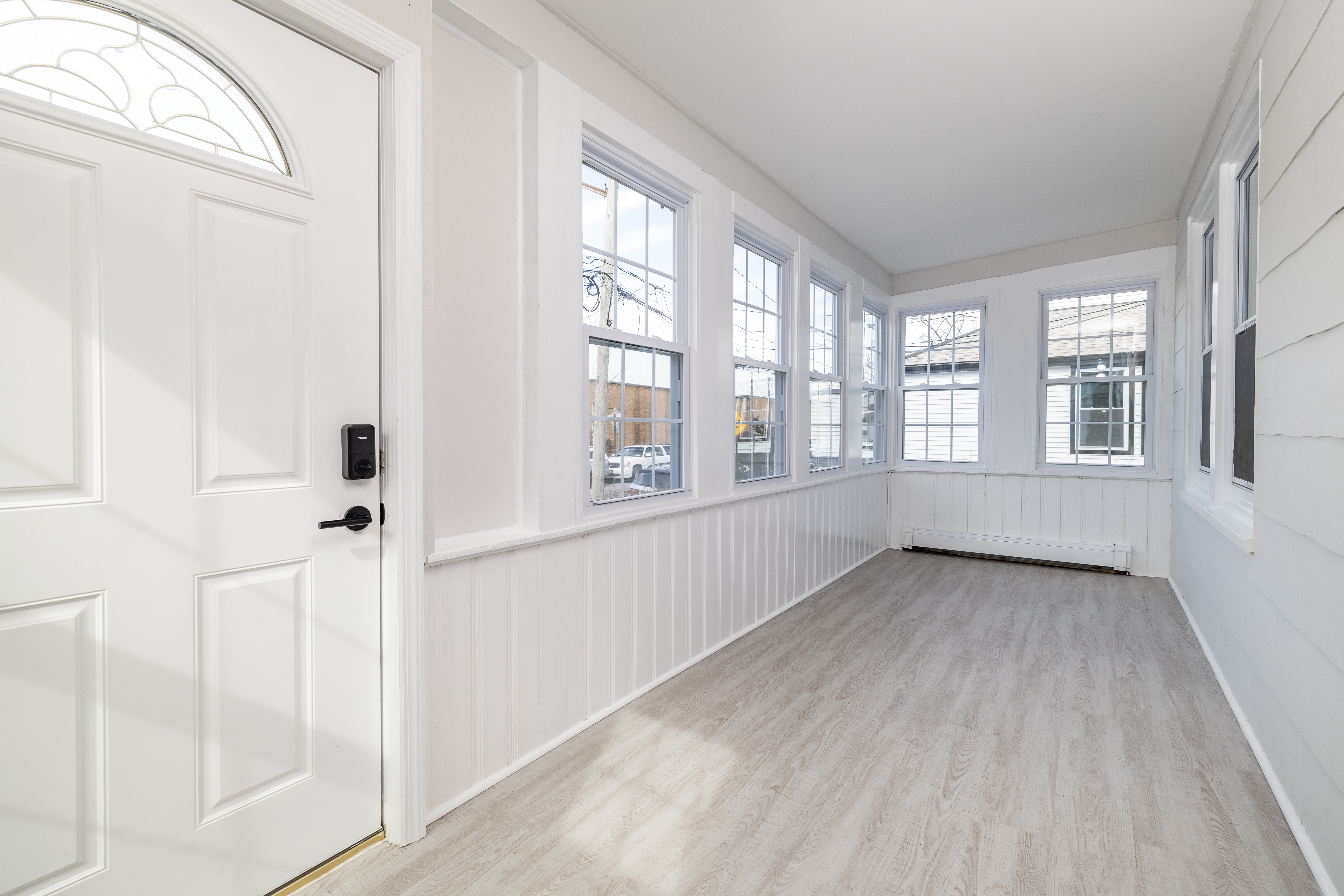 13-03 Brunswick Avenue Queens, NY 11691 - Photo 12 of 27 a view of an empty room with a window