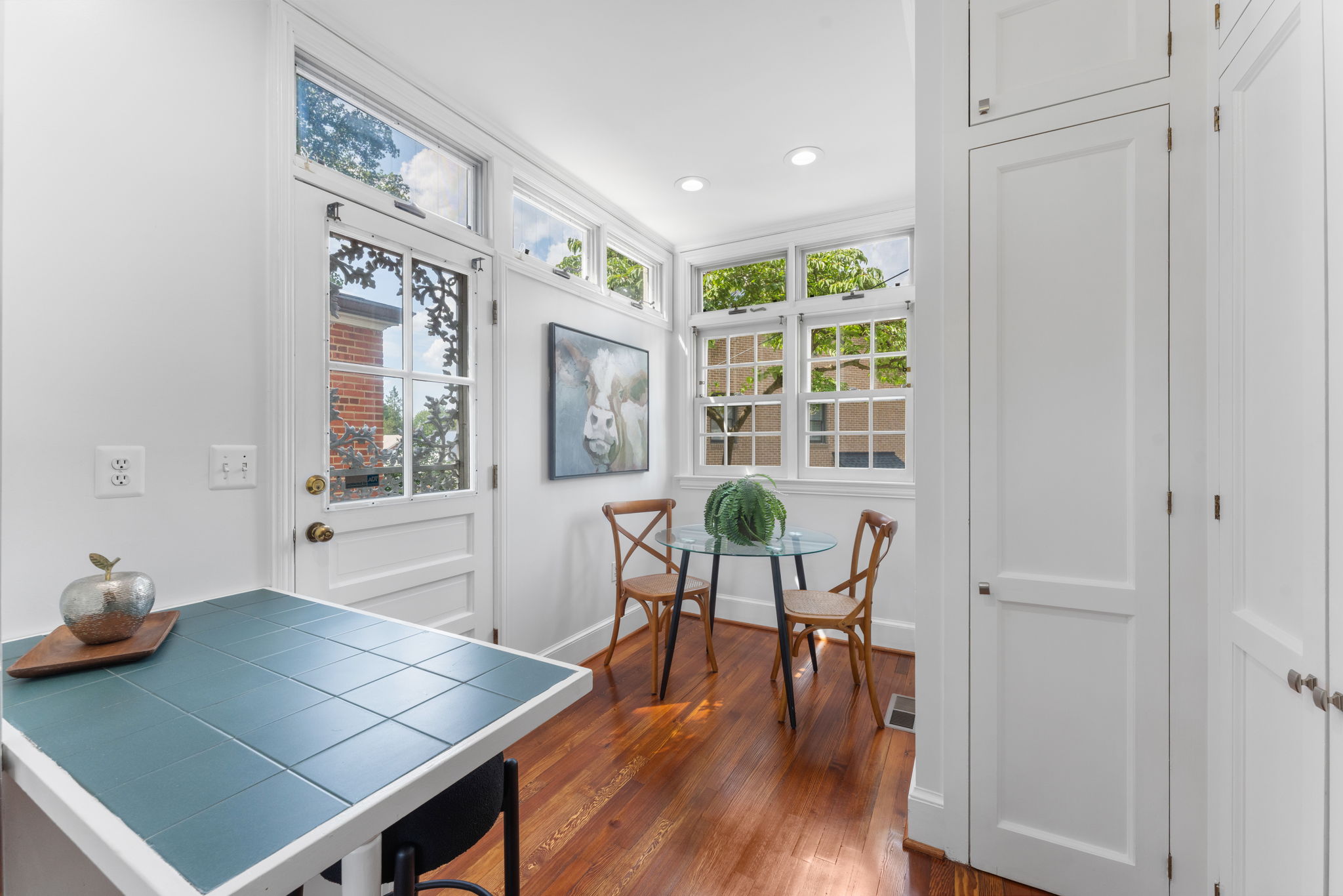 1325 Locust Road Northwest Washington, DC 20012 - Photo 21 of 56 a view of a dining room with furniture window and wooden floor