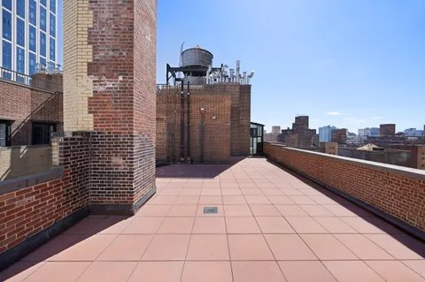 a terrace with a bench
