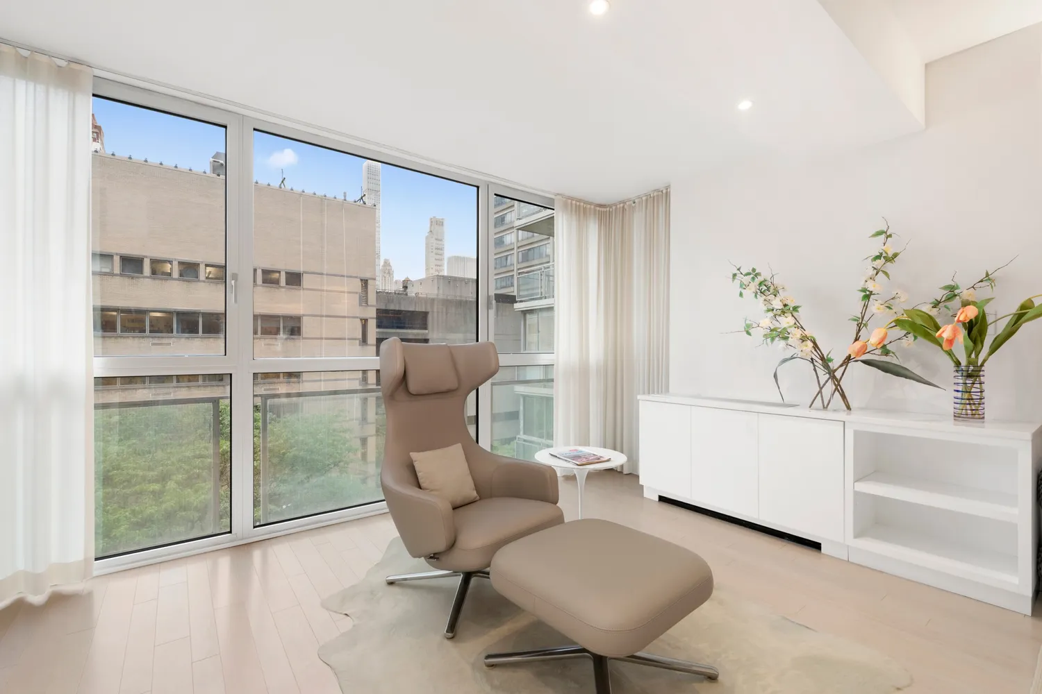 a living room with furniture and a gate