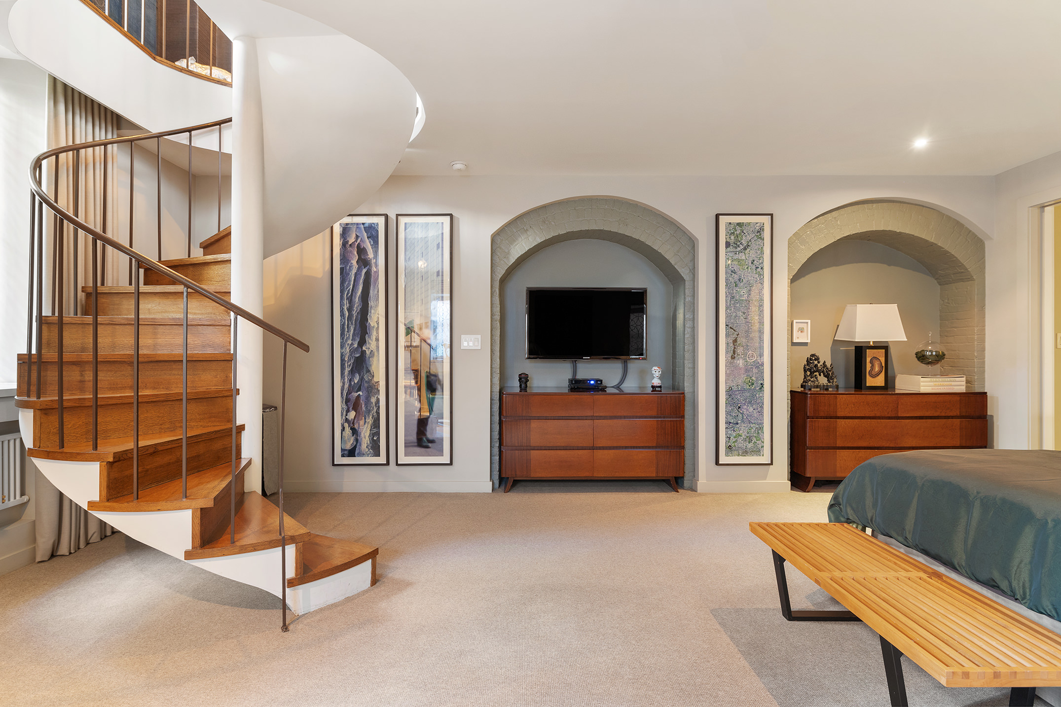 23 Park Avenue, Unit 1A Manhattan, NY 10016 - Photo 10 of 18 a living room with furniture and a flat screen tv