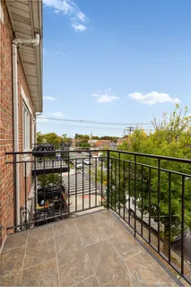 a view of a balcony with city view